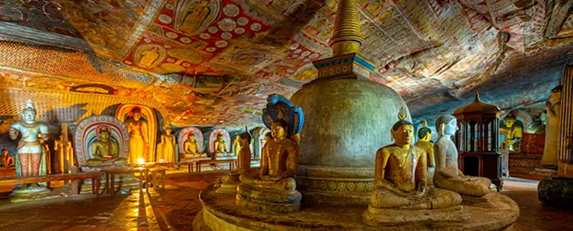 Dambulla cave temple painted interior and golden statues